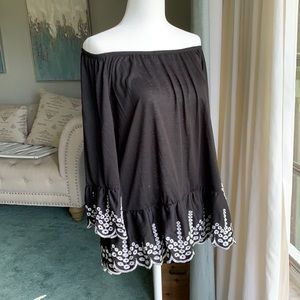 Black three quarter length sleeve shirt